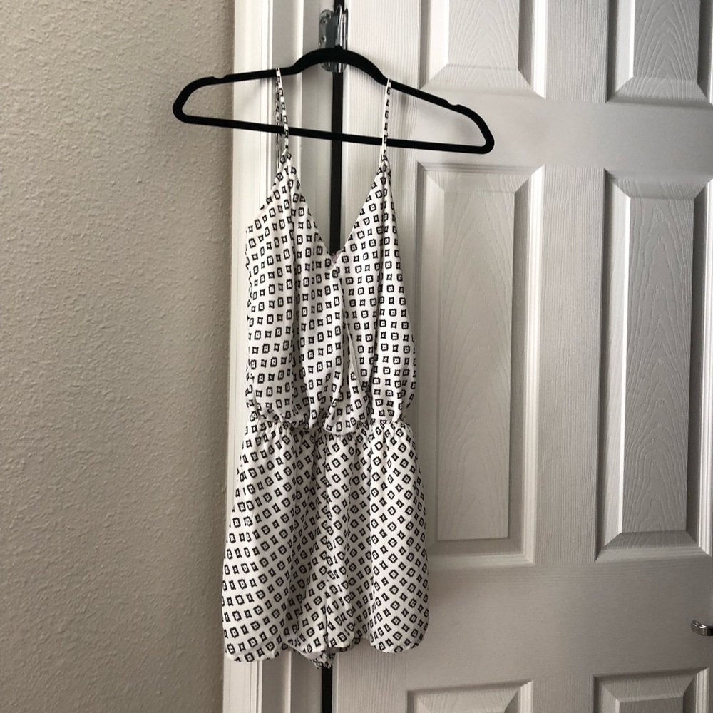 White and black Francesca’s patterned romper